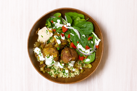 Lamb rissole bowl with spinach and couscous