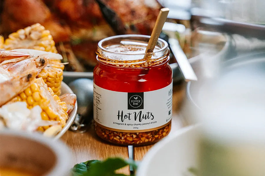 jar of spicy peanut sauce with spoon