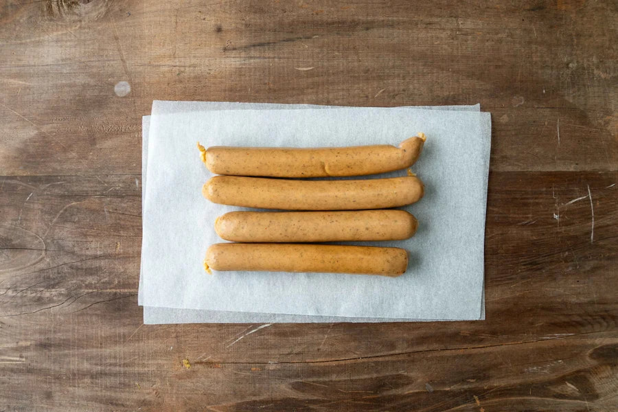 spicy gourmet hotdogs uncooked