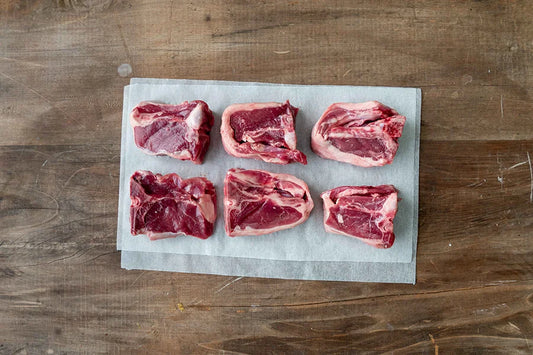 lamb chops sitting on tabletop